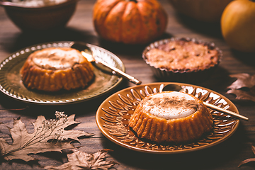 Image showing Pumpkin mini pie, tartlet made for Thanksgiving day on old woode