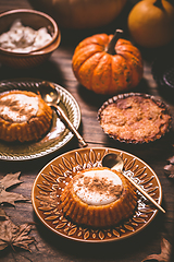 Image showing Pumpkin mini pie, tartlet made for Thanksgiving day on old wooden background