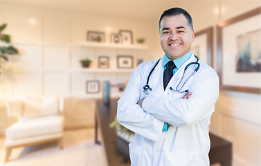 Image showing Handsome Hispanic Doctor or Nurse Standing in His Office