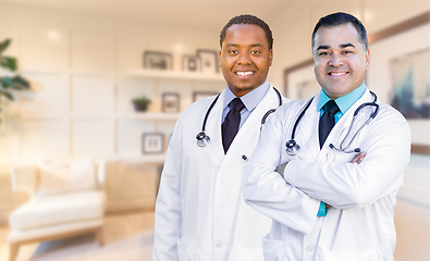 Image showing African American and Hispanic Doctors or Nurses Standing in Offi