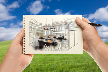 Image showing Male Hands Holding Pen and Pad of Paper Up with Custom Kitchen I