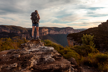 Image showing Hiking woman in mountain precipice with extraordinary views