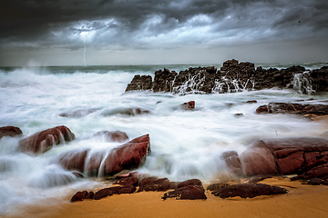 Image showing Storm over beach and turbulent waves