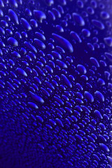Image showing dark blue water drops background