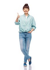 Image showing happy asian woman over white background