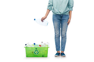 Image showing young woman sorting plastic waste
