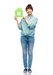 Image showing smiling asian woman holding green house