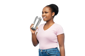 Image showing woman with thermo cup or tumbler for hot drinks