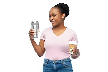 Image showing woman with coffee cup and tumbler for hot drinks