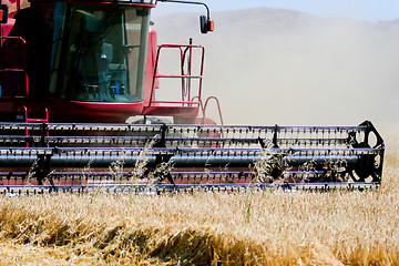 Image showing combine harvester on field