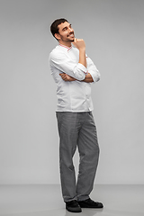 Image showing happy smiling thinking male chef in toque
