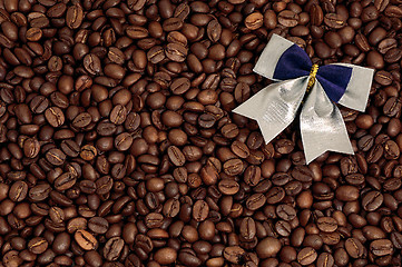 Image showing Coffee beans background and bow