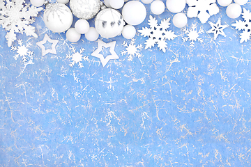 Image showing Fantasy Christmas Blue Background with Snowflakes and Baubles