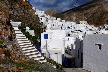 Image showing Dramatic view of the town of Chora in Serifos island, Greece under cloudy sky