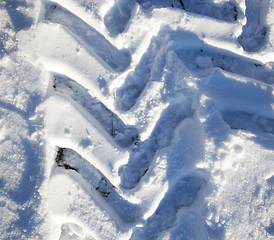 Image showing Ruts on the snow-covered road