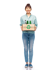 Image showing smiling young asian woman sorting glass waste