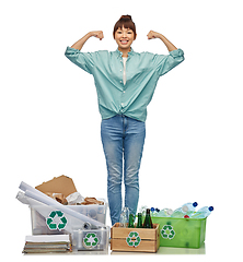 Image showing happy woman sorting paper, metal and plastic waste