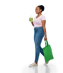 Image showing happy woman with drink and food in reusable bag