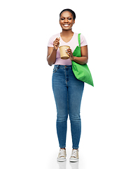 Image showing happy woman with reusable bag for food and wok