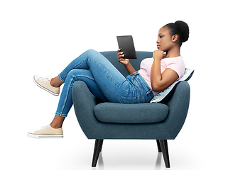 Image showing woman with tablet pc sitting in armchair