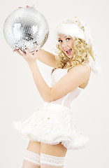 Image showing sexy santa helper with disco ball