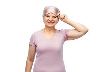 Image showing senior woman in pajamas and eye sleeping mask