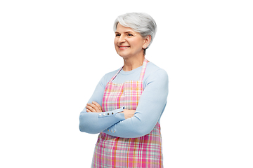 Image showing portrait of smiling senior woman in apron