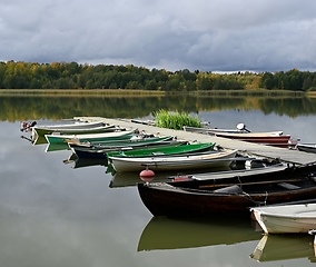 Image showing boats at the pier on lake