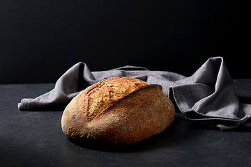 Image showing homemade craft bread on table