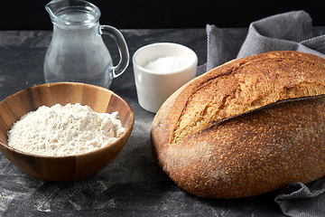 Image showing bread, wheat flour, salt and water in glass jug