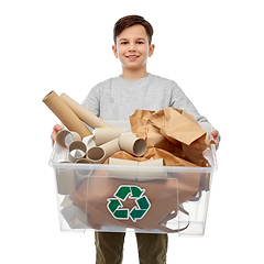 Image showing smiling boy sorting paper waste