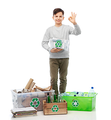 Image showing smiling boy sorting paper, metal and plastic waste