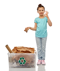 Image showing smiling girl sorting paper waste