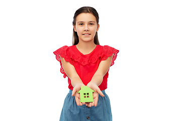 Image showing smiling little girl holding green house icon