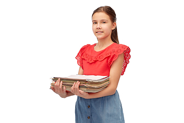 Image showing smiling girl with magazines sorting paper waste