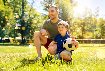 Image showing father and little son with soccer ball at park