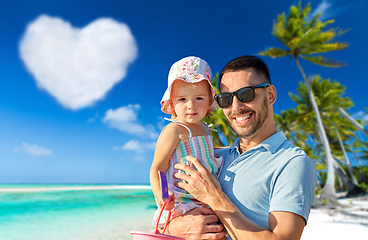 Image showing happy father with little daughter on beach