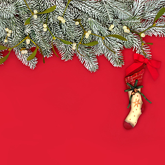 Image showing Christmas Stocking for Xmas Eve Snow Fir Background  