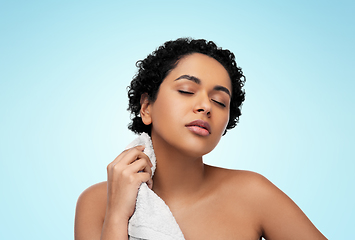 Image showing young african american woman with bath towel