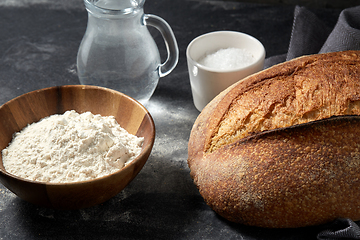 Image showing bread, wheat flour, salt and water in glass jug