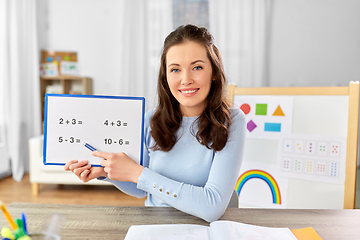 Image showing math teacher having online class at home