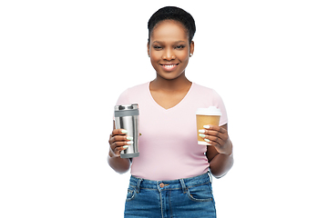 Image showing woman with coffee cup and tumbler for hot drinks