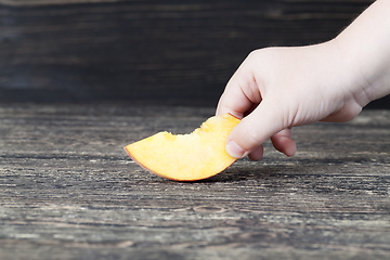 Image showing one cut fresh soft peach