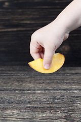 Image showing one cut fresh soft peach