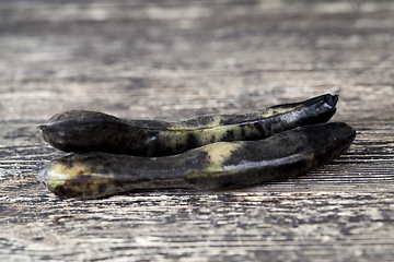 Image showing black dry pods of bean