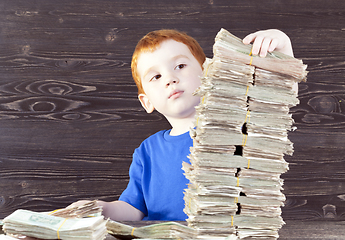 Image showing boy builds tower,