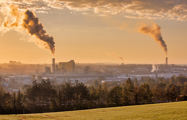 Image showing industrial cityscape with with smoking factory