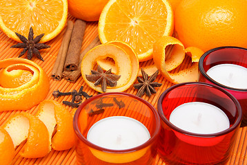 Image showing Candles, oranges and spices