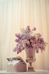 Image showing Lilac bouquet in a silver vase