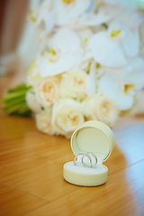 Image showing wedding bouquet and rings